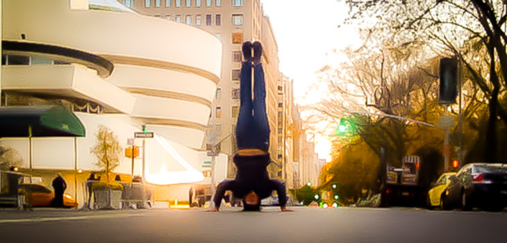 squeek steele does a headstand on 5th Ave, NYC